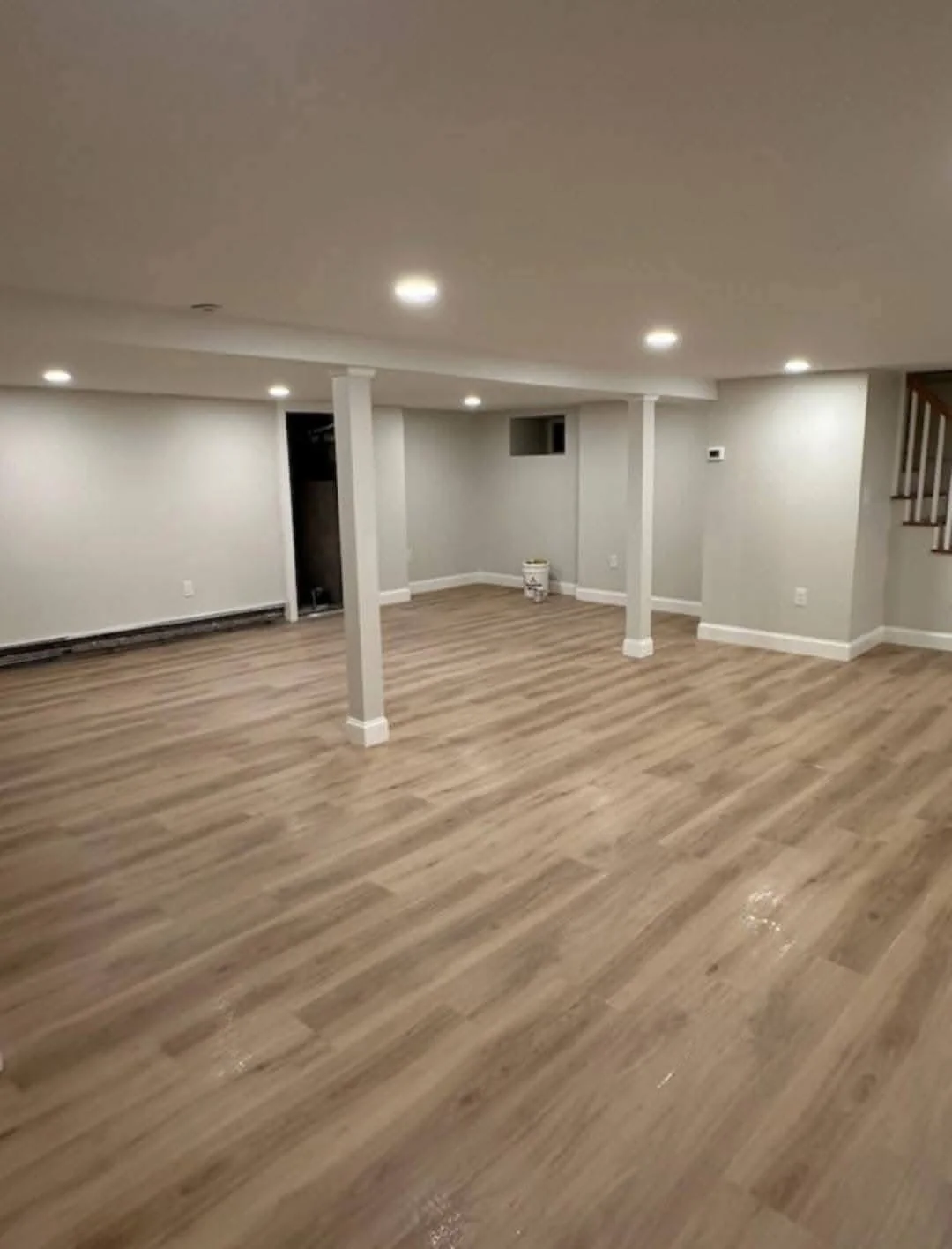 Completed room with light gray wood-look tile floor